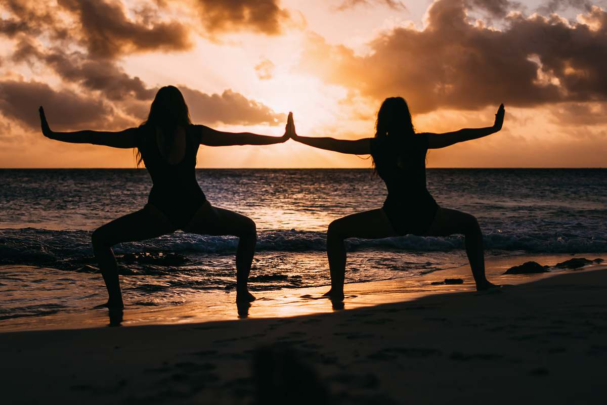 working out silhouette of two persons fitness